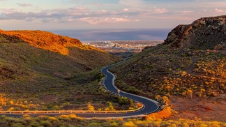 A beautiful empty road through the canyon to the Atlantic ocean on the island of Gran Canaria