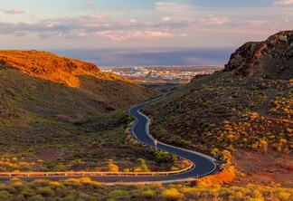 A beautiful empty road through the canyon to the Atlantic ocean on the island of Gran Canaria